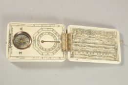 A BONE FOLDING ENGRAVED COMPASS. 9cms x 6cms.