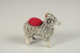 A NOVELTY SILVER RAM PIN CUSHION. 4cms.