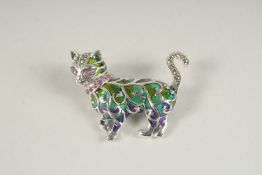 A SILVER AND PLIQUE ENAMEL RUBY EYE CAT BROOCH.