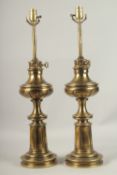 A PAIR OF BRASS STIFFEL LAMPS. 50cms high.