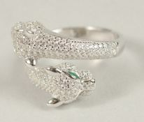 A SILVER DOUBLE HEAD PANTHER RING.