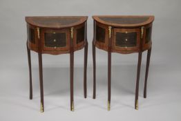 A PAIR OF LOUIS XVITH STYLE MAHOGANY DEMI-LUNE BEDSIDE TABLES with three small drawers supported