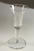 A PLAIN GEORGIAN WINE GLASS with inverted bell bowl. 17cms high.