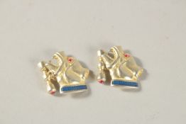 A PAIR OF RUSSIAN SILVER AND BLUE ENAMEL DOG CUFFLINKS. Weight 18grms.