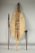 A 19TH CENTURY ZULU SHIELD, KNOBKERRIE AND AN ASSEGAI SPEAR.