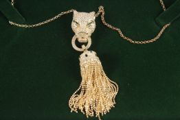 A SILVER AND GOLD PANTHER HEAD TASSEL NECKLACE.