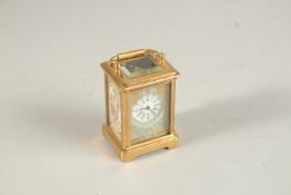 A GOOD MINI SEVRES DESIGN CLOCK with painted panel. 6cms high.