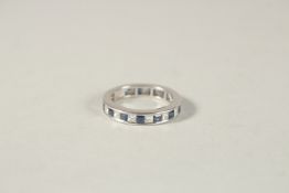 AN 18CT WHITE GOLD, SAPPHIRE AND DIAMOND FULL ETERNITY RING.