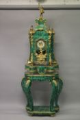 A SUPERB LOUIS XVITH DESIGN MALACHITE CLOCK ON A STAND with gilt metal figures, eight-day