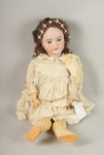 SIMON & HALBIG GERMAN BISQUE DOLL, CIRCA. 1910, impressed Simon Halbig, DEP 1079, with weighted