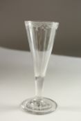 A GEORGIAN TAPERING WINE GLASS with engraved rim. 16cms high.