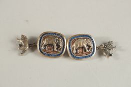 A PAIR OF RUSSIAN SILVER AND SAPPHIRE ELEPHANT CUFFLINKS. Weight 28grms.
