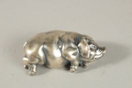 A RUSSIAN SILVER SLEEPING PIG. 6.5cms long. Marks: Head 84 Faberge IP. Weight 42grms.