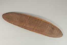 A RARE AUSTRALIAN ABORIGINAL CARVED WOOD SHIELD, the reverse with a hand hole, etched with zig zag