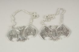 A PAIR OF BAT'S WING WINE LABELS, WHISKY AND SHERRY.