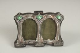 A MINIATURE SILVER DOUBLE PHOTOGRAPH FRAME. 8cms x 11cms.
