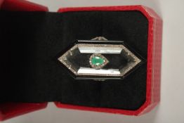 A SILVER ROCK CRYSTAL, EMERALD AND DIAMOND DECO RING.