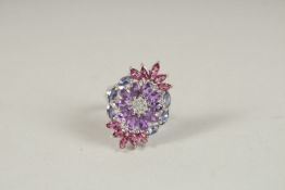 A SILVER AMETHYST AND TOURMALINE CLUSTER RING.
