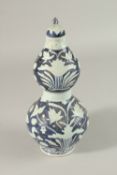 A CHINESE BLUE AND WHITE DOUBLE GOURD VASE. 30cms high.