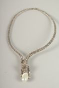 A SILVER MARCASITE AND BAROQUE PEARL NECKLACE.