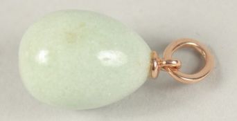 A RUSSIAN SILVER RHODANITE EGG PENDANT.