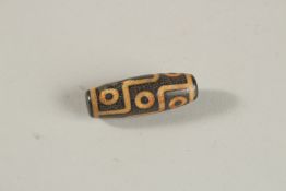 AN AGATE DZI BEAD.