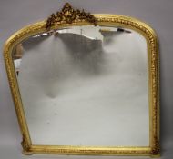 A LARGE LOUIS XVITH DESIGN GILTWOOD OVERMANTLE MIRROR with domed top and garlands. 160cms high x