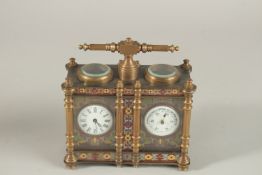 A CLOISONNE ENAMEL DOUBLE CARRIAGE CLOCK with carrying handle. 12cms wide.