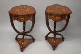 A GOOD PAIR OF INLAID MAHOGANY SHAPED BEDSIDE TABLES with a single drawer on curving supports with
