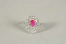 A RUBY AND CZ RING. Ring size O-P.