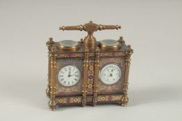 A DOUBLE CLOISONNE ENAMEL CLOCK with carrying handle. 17.5cms wide.