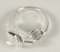 A SILVER PANTHER HEAD RING.