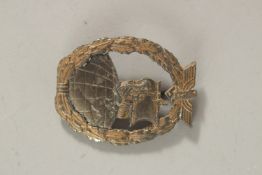 A WWII GERMAN NAVAL BADGE.
