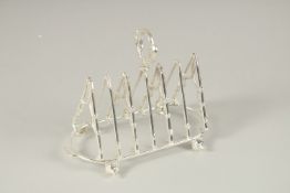 A SILVER PLATE HUNTING TOAST RACK.
