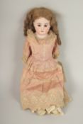 ARMAND MARSEILLE BISQUE HEADED DOLL, No. 3200, articulated body, open and shut eyes, clothed, long