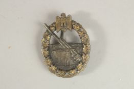 A WWII GERMAN BADGE.