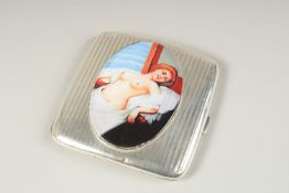 AN ENGINE TURNED SILVER CIGARETTE CASE. Birmingham 1922, with a glamour model enamel.