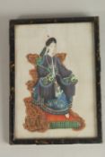 A CHINESE PITH PAINTING, depicting an enthroned figure in traditional robes, framed and glazed, 23cm