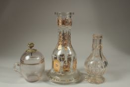 TWO 19TH CENTURY OTTOMAN MARKET GILDED GLASS HUQQA BASES, and another 19th century Ottoman Turkish