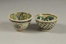 TWO 18TH CENTURY OTTOMAN TURKISH KUTAHYA COFFEE CUPS.