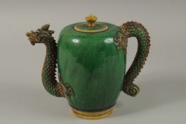 A FINE CHINESE GREEN AND YELLOW GLAZED TEAPOT OR WATER DROPPER, with dragon formed handle and spout,