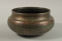 A FINE 17TH-18TH CENTURY PERSIAN SAFAVID ENGRAVED TINNED COPPER BOWL, with two rows of very fine