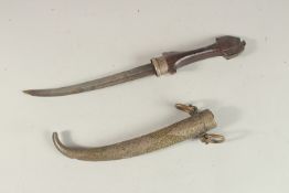 A MOROCCAN DAGGER WITH SILVER INLAID SCABBARD, 39cm long.