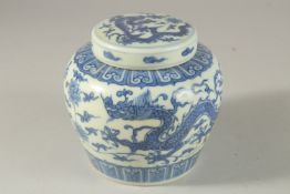 A CHINESE BLUE AND WHITE PORCELAIN DRAGON JAR AND COVER, 12cm high.