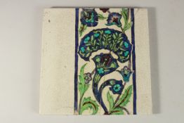 A RARE WILLIAM DEMORGAN GLAZED POTTERY TILE, in the Islamic Damascus style, signed to the reverse,