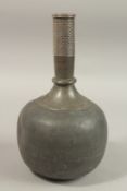 A RARE 18TH CENTURY MUGHAL INDIAN SILVER MOUNTED LEAD SURAHI BOTTLE, 30cm high.