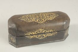 A TURKISH LEATHER OVERLAID WOODEN PEN BOX, 22.5cm long.