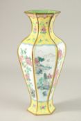 A CHINESE CANTON YELLOW GROUND ENAMELLED HEXAGONAL VASE, 33cm high.