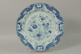 A CHINESE BLUE AND WHITE PORCELAIN CHARGER, (af), 38cm diameter.
