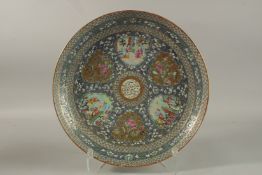 A VERY FINE CHINESE CANTON ISLAMIC MARKET PORCELAIN CHARGER, beautifully decorated with central